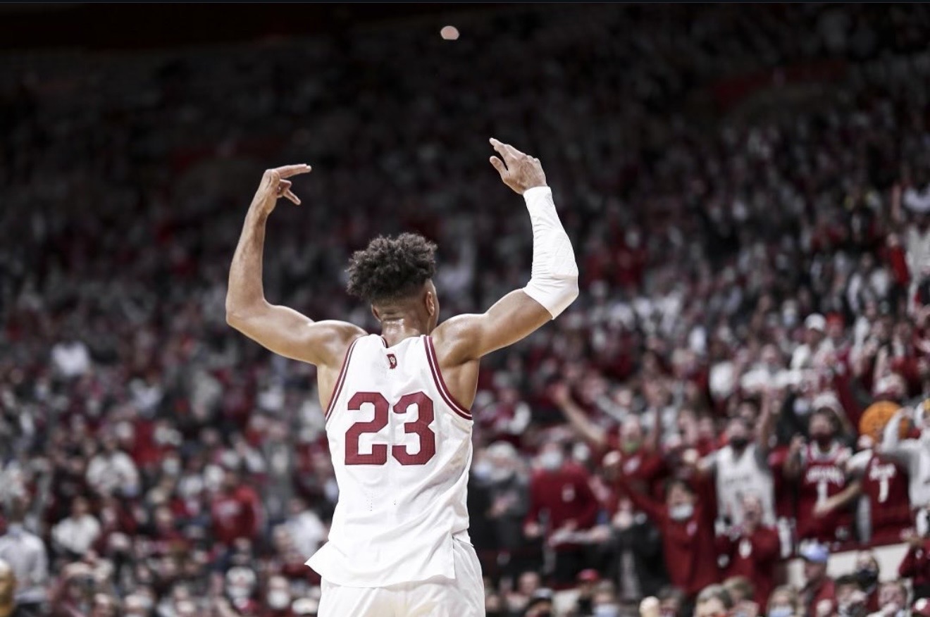 Trayce Jackson-Davis celebrating with his back to the crowd in an Indiana basketball uniform